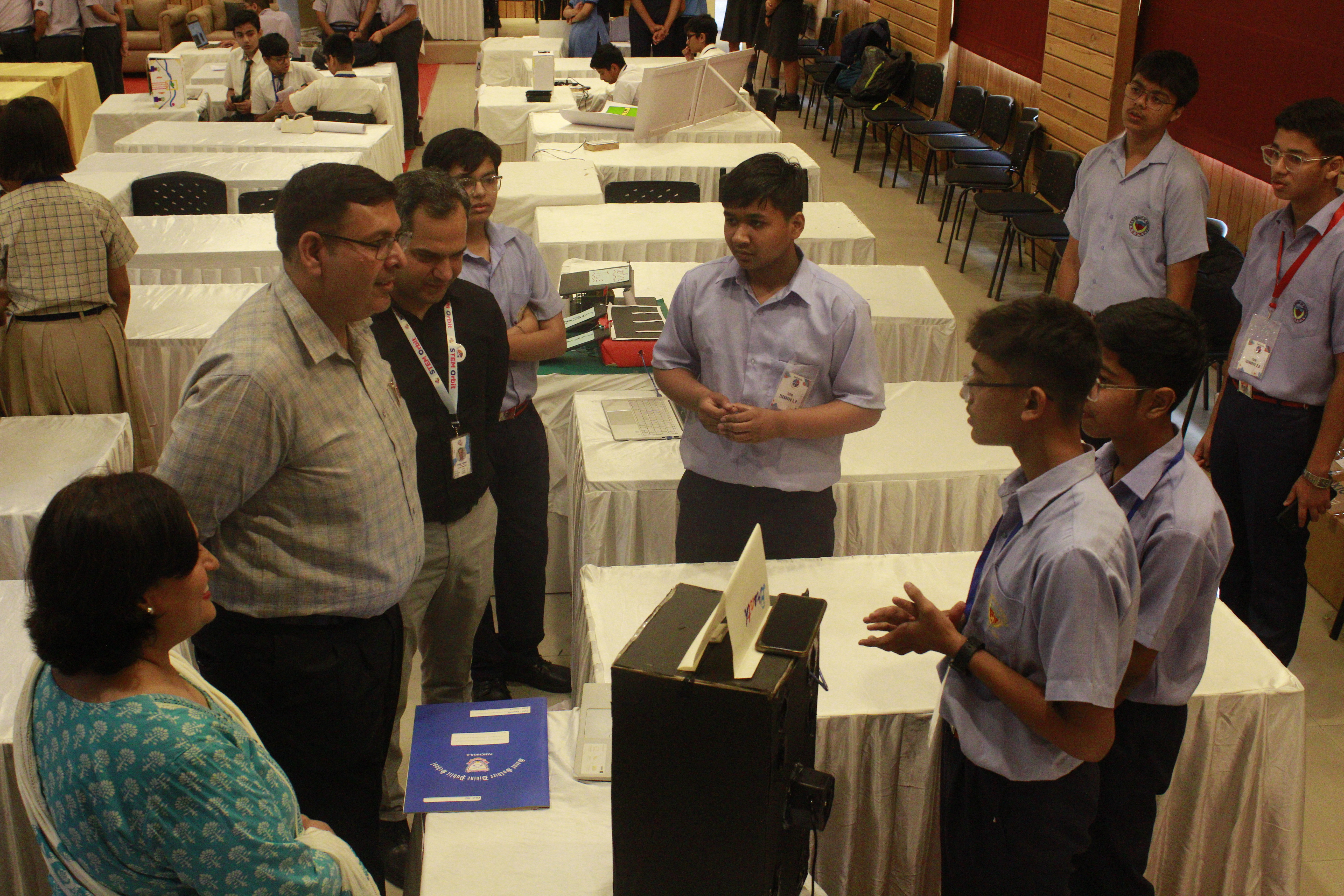 Students presenting projects to judges